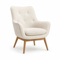 Fauteuil lounge a dossier haut capitonne en polyester boucle ecru pieds en hevea massif 75 x 82 x 98 cm